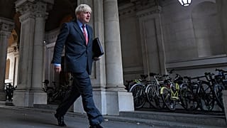 UK Prime Minister Boris Johnson walks to Downing Street in London on September 22, 2020 after attending the weekly cabinet meeting at the Foreign Office.