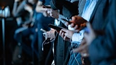 People looking at their phones.