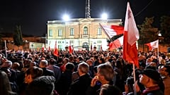 People gather for a protest called by the family of killed journalist Daphne Caruana Galizia and civic movements on December 3, 2019 outside the police HQ in Valletta.