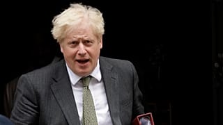 British Prime Minister Boris Johnson leaves 10 Downing Street in London, Wednesday, Sept. 23, 2020.