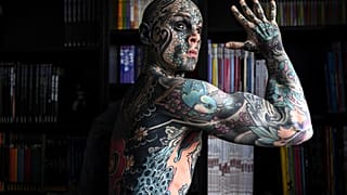 Schoolteacher tattooed