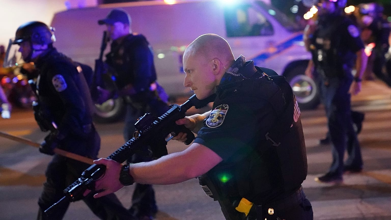 Police move after two Louisville police officers was shot, Wednesday, September 23, 2020, in Louisville, Kentucky.