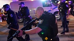 Police move after two Louisville police officers was shot, Wednesday, September 23, 2020, in Louisville, Kentucky.