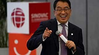 Yin Weidong, CEO of the Chinese pharmaceutical company SinoVac, speaks to journalists during a tour of a vaccine factory in Beijing on Thursday, Sept. 24, 2020.