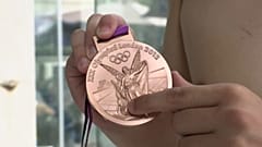 السباح الصيني جيانغ هايكي يعتزل السباحة للانخراط في شرطة السواحل