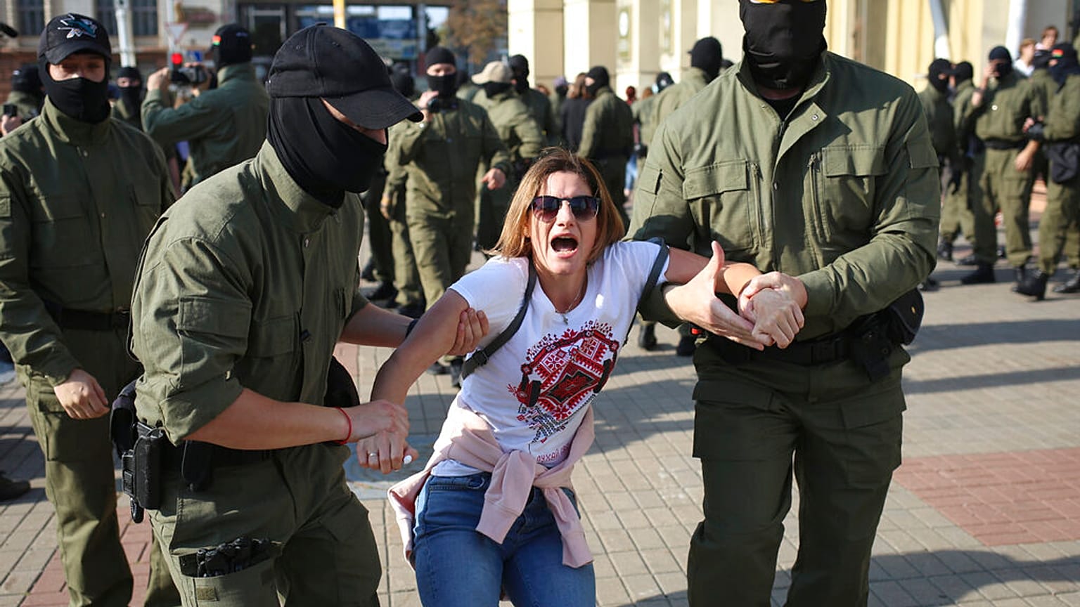 Police detain a protester during an opposition rally to protest the official presidential election results in Minsk, Belarus, Saturday, Sept. 26, 2020.