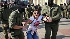 Police detain a protester during an opposition rally to protest the official presidential election results in Minsk, Belarus, Saturday, Sept. 26, 2020.