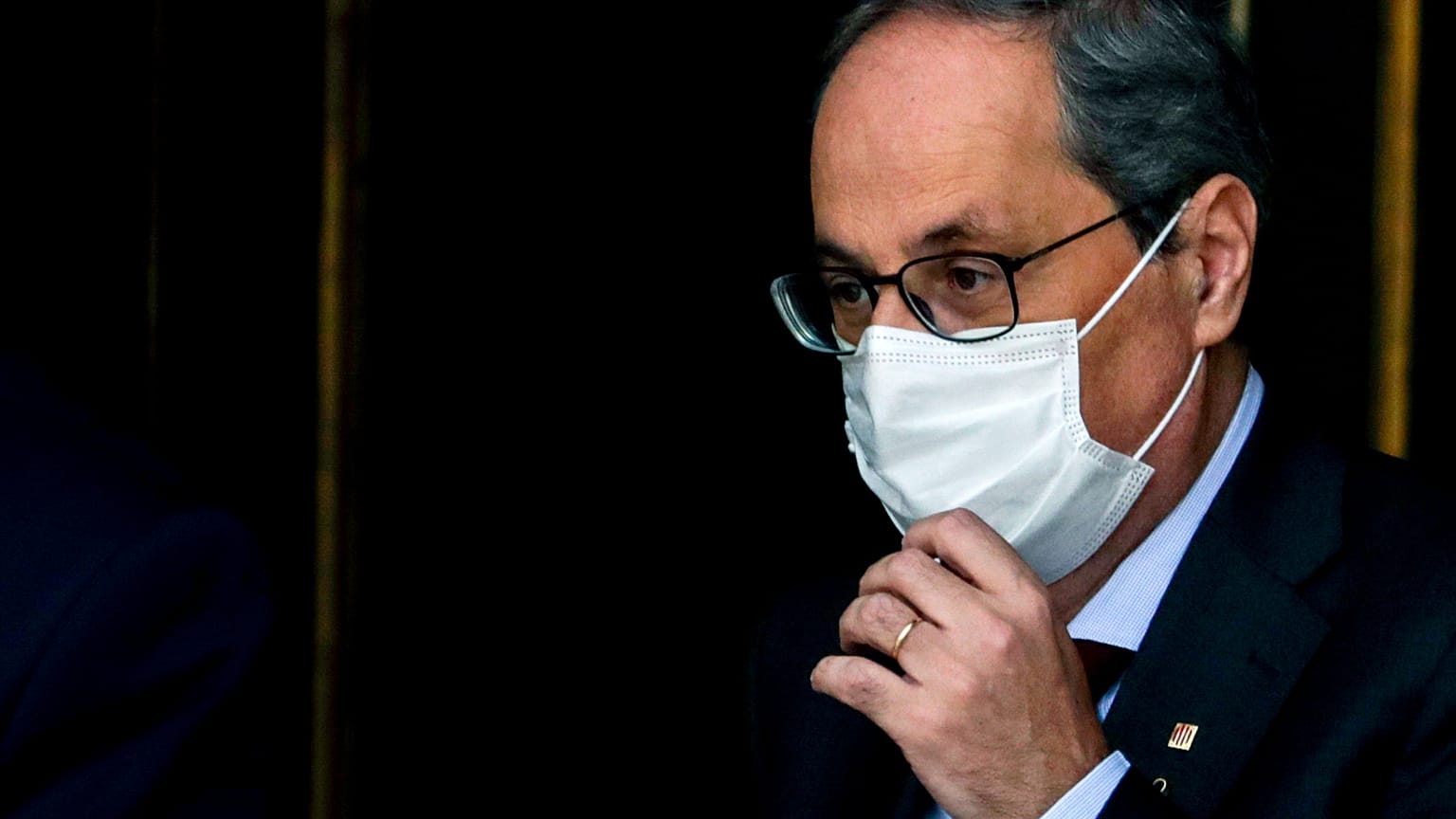 Catalan regional President Quim Torra leaves the Spanish Supreme Court in Madrid, Spain, Thursday, Sept. 17, 2020.