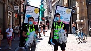 Masks are handed out to the public in Amsterdam