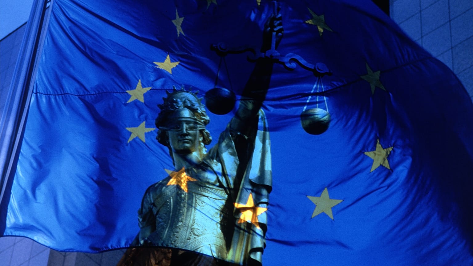EU flag and justice symbol