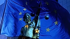 EU flag and justice symbol