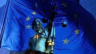 EU flag and justice symbol