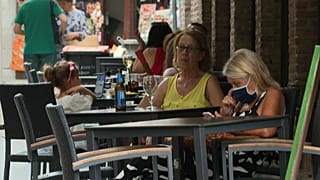 Spain's central government is clashing with Madrid's authority over the need for stronger COVID-19 restrictions 