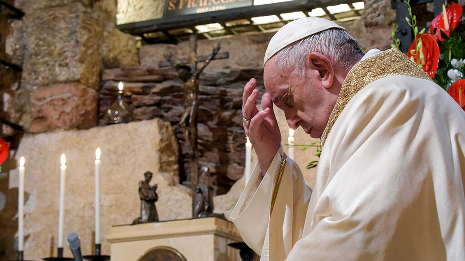 Pope Francis celebrates Mass in the crypt of the Basilica of St. Francis, in Assisi, Italy, Saturday, Oct. 3, 2020. 