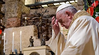 Pope Francis celebrates Mass in the crypt of the Basilica of St. Francis, in Assisi, Italy, Saturday, Oct. 3, 2020.