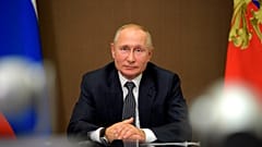 Russian President Vladimir Putin attends a meeting with Moldova's President Igor Dodon via video conference on September 28, 2020. 