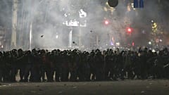 Riot police move to disperse protesters during a rally against the results of a parliamentary vote in Bishkek, Kyrgyzstan, Monday, Oct. 5, 2020.