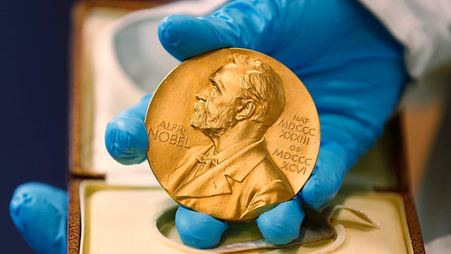 A gold Nobel Prize medal given to recipients of the prestigious award.