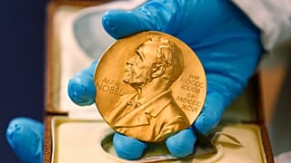 A gold Nobel Prize medal given to recipients of the prestigious award.