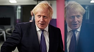 Britain's Prime Minister Boris Johnson visits the headquarters of Octopus Energy in London, Monday October 5, 2020.