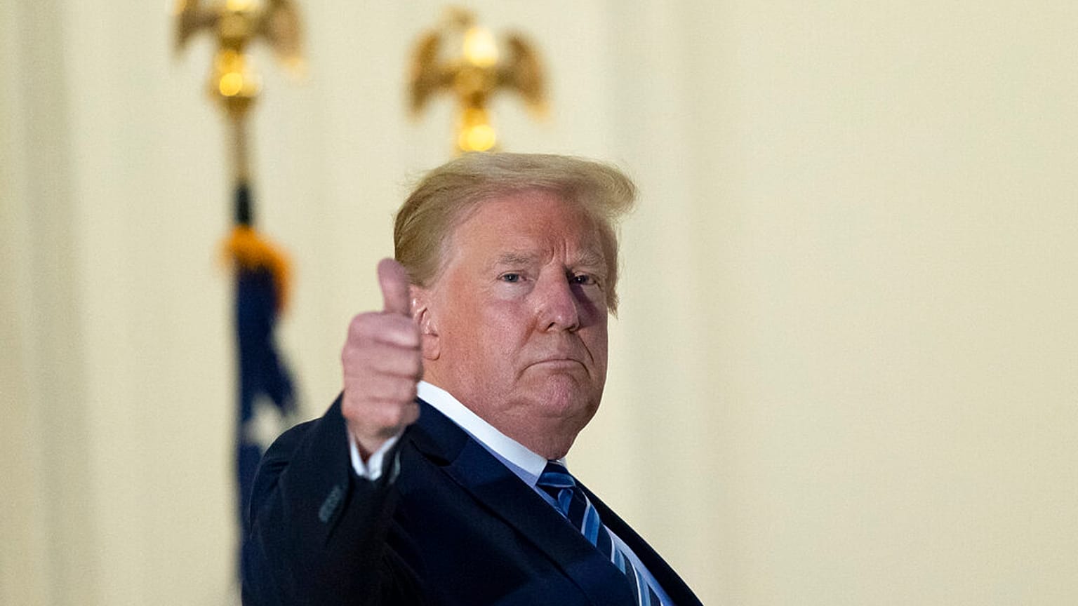 Donald Trump said 'we are learning to live with Covid' as he compares it to the flu