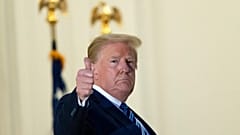 Donald Trump said 'we are learning to live with Covid' as he compares it to the flu