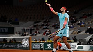 Spain's Rafael Nadal plays a shot against Italy's Jannik Sinner in the quarterfinal match of the French Open tennis tournament at the Roland Garros stadium in Paris.