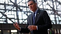 Pedro Sanchez speaks on camera as he arrives for a European Union (EU) summit at the European Council Building in Brussels on October 1, 2020. European leaders are meeting to 