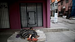 Homeless women sleep outside during a government-ordered lockdown to curb the spread of COVID-19 in Buenos Aires, Argentina on May 6, 2020