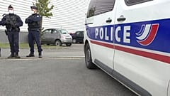 Police officers at the scene of a shooting which left two police officers in serious condition in hospital