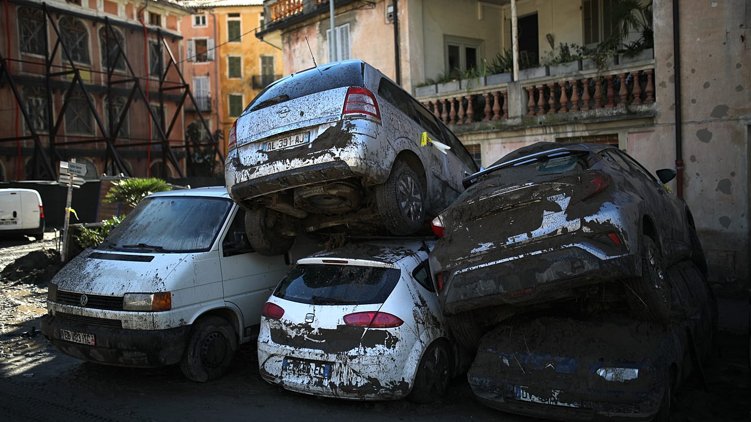 Cars stacked on top of each other by clean up crews are pictured in Breil-sur-Roya, near the border with Italy. October 5, 2020