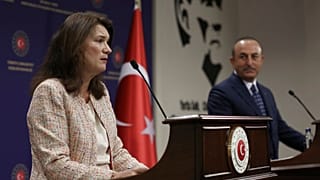 Sweden's Foreign Minister Ann Linde, right, and Turkish Foreign Minister Mevlut Cavusoglu 