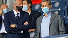 Eski Fransa Cumhurbaşkanı Nicolas Sarkozy (sağda)