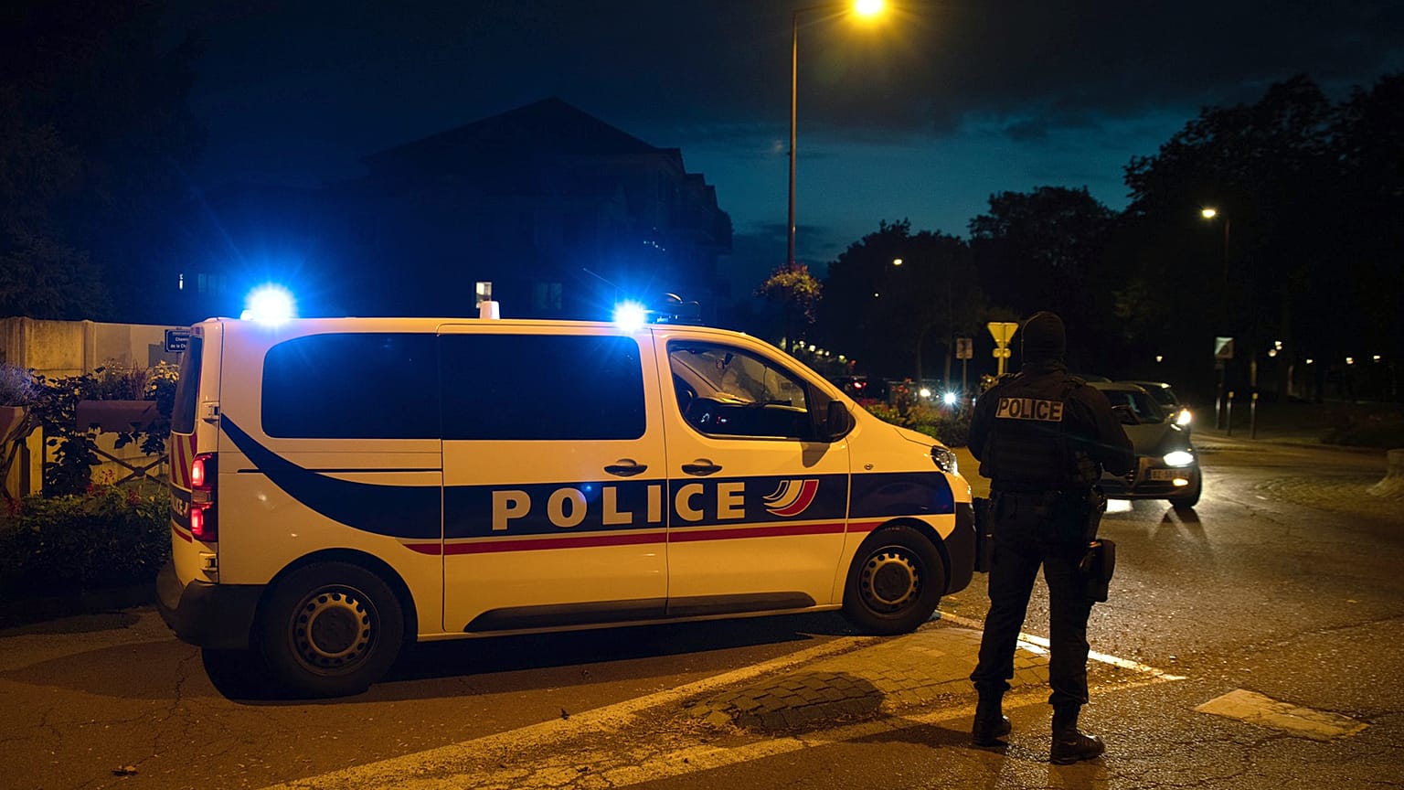 French police officers stand guard a street in Eragny on October 16, 2020