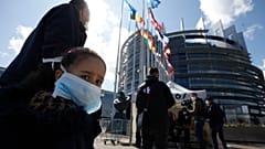 File photo: People wait in line to be tested for COVID-19 outside the European Parliament in Strasbourg, eastern France. May 12, 2020.
