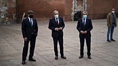 Carles Puigdemont, left, Quim Torra, centre, and Artur Mas, right, pose for a picture in Perpignan.