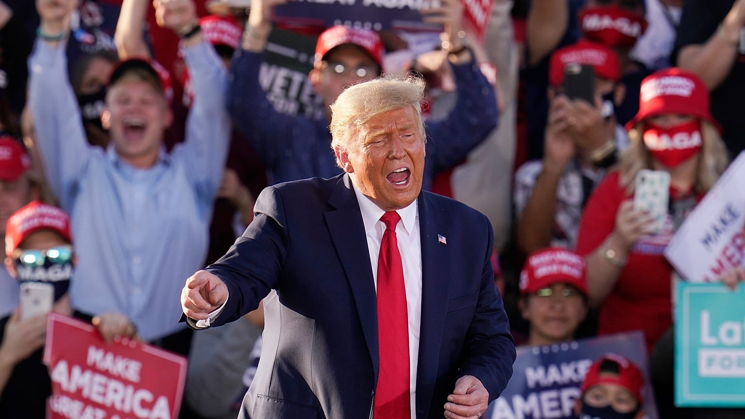 President Donald Trump works the crowd after speaking at a campaign rally Monday, Oct. 19, 2020, in Tucson, Arizona.