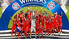 Bayern's goalkeeper Manuel Neuer lifts the trophy after Munich won the Champions League final soccer match.