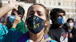 Students attend a "Fridays For Future" protest rally in Rome, Friday, Oct. 9, 2020