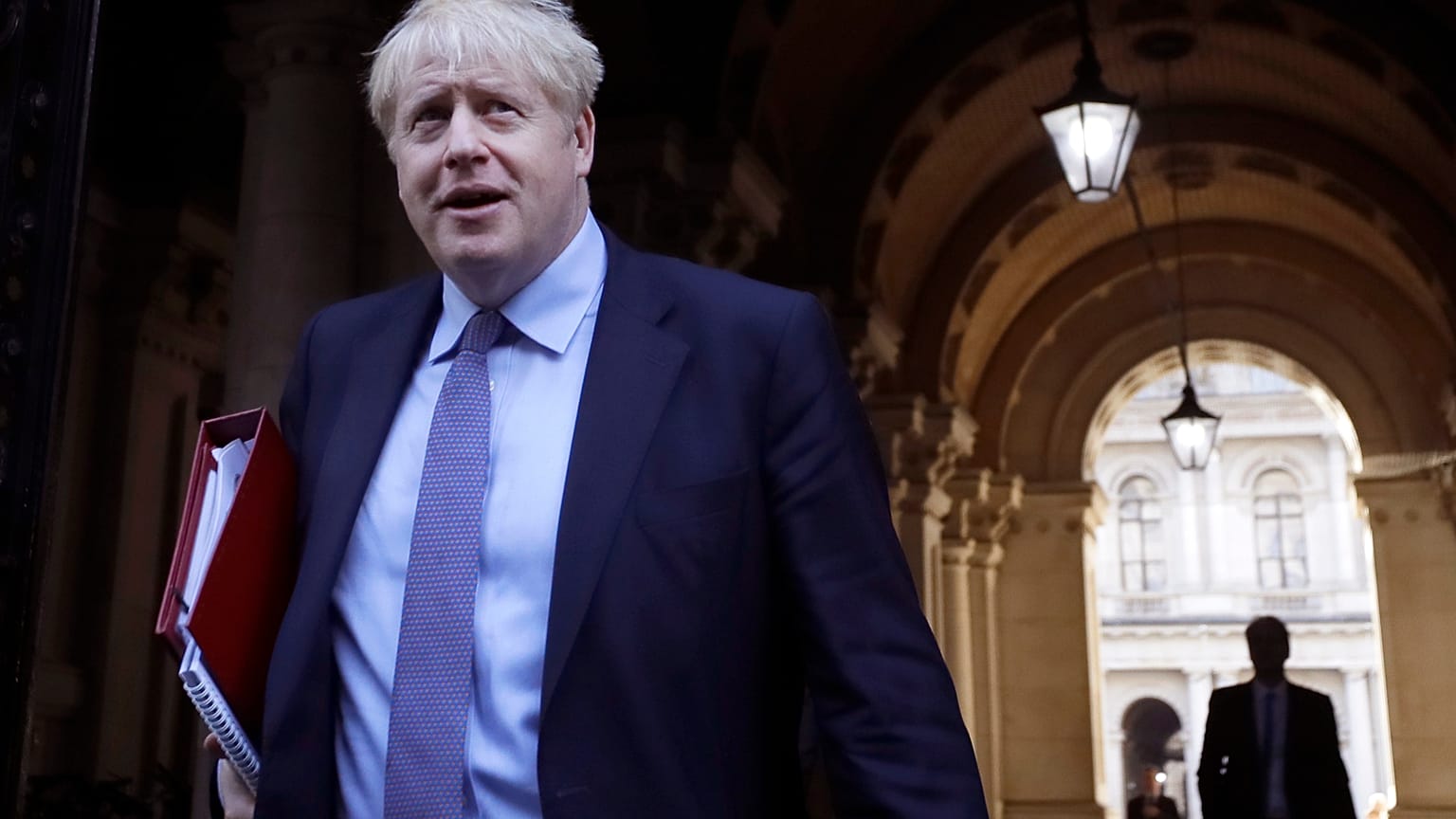 Britain's Prime Minister Boris Johnson returns to Downing Street after attending a Cabinet meeting in London, Tuesday, Oct. 20, 2020. 