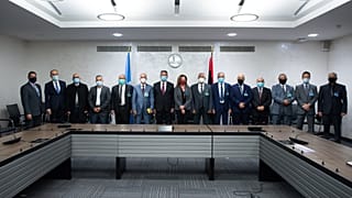 Special representative of the UN Secretary-General in Libya and representatives of the rival factions in the Libya conflict during the talks in Geneva, on October 19, 2020