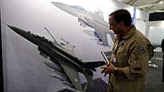 In this Feb. 5, 2020, file photo, Lockheed Martin's Robert Balserak, Lead Executive, Air Superiority Programs, explains the capabilities of the F-21 at the DefExpo in Lucknow