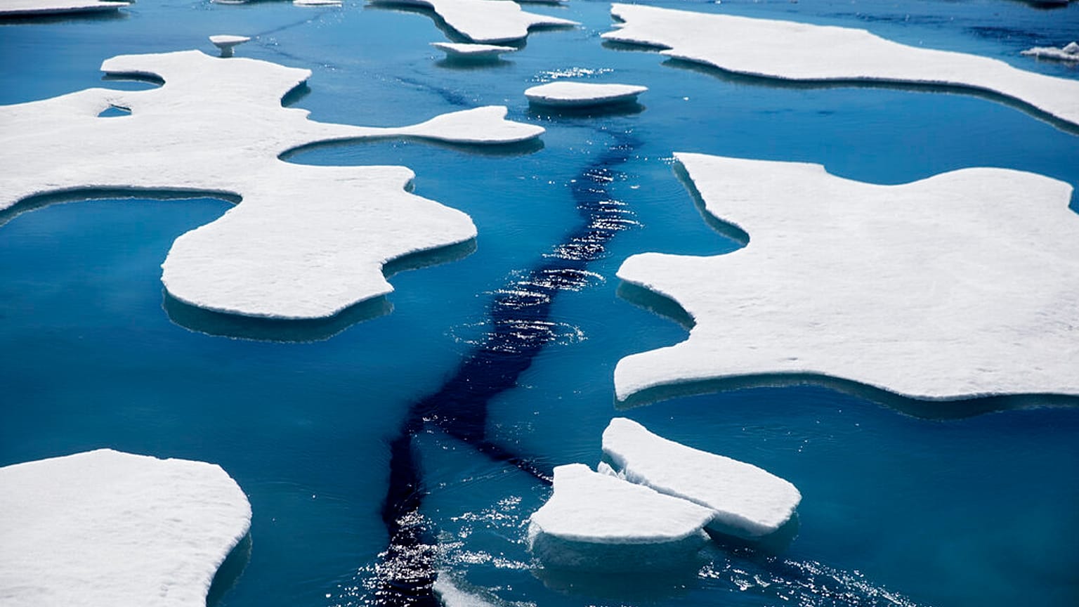 FILE - Sea ice breaks apart as the Finnish icebreaker MSV Nordica traverses the Northwest Passage through the Victoria Strait in the Canadian Arctic Archipelago - July, 2017.