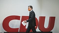 Paul Ziemiak, secretary general of the conservative Christian Democratic Union party (CDU) arrives for a news conference in Berlin.