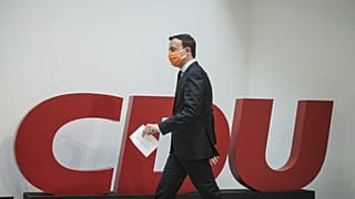 Paul Ziemiak, secretary general of the conservative Christian Democratic Union party (CDU) arrives for a news conference in Berlin.
