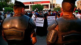 عراقيون يحتجون على تصريحات ماكرون بخصوص الرسوم الكاريكاتورية