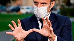 Президент Макрон показывает, как он собирается сдерживать пандемию