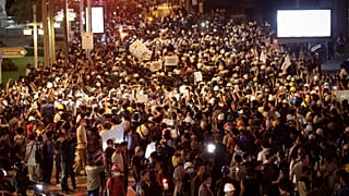 Pro-democracy demonstrators march to the German Embassy in central Bangkok, Thailand, Monday, Oct. 26, 2020.