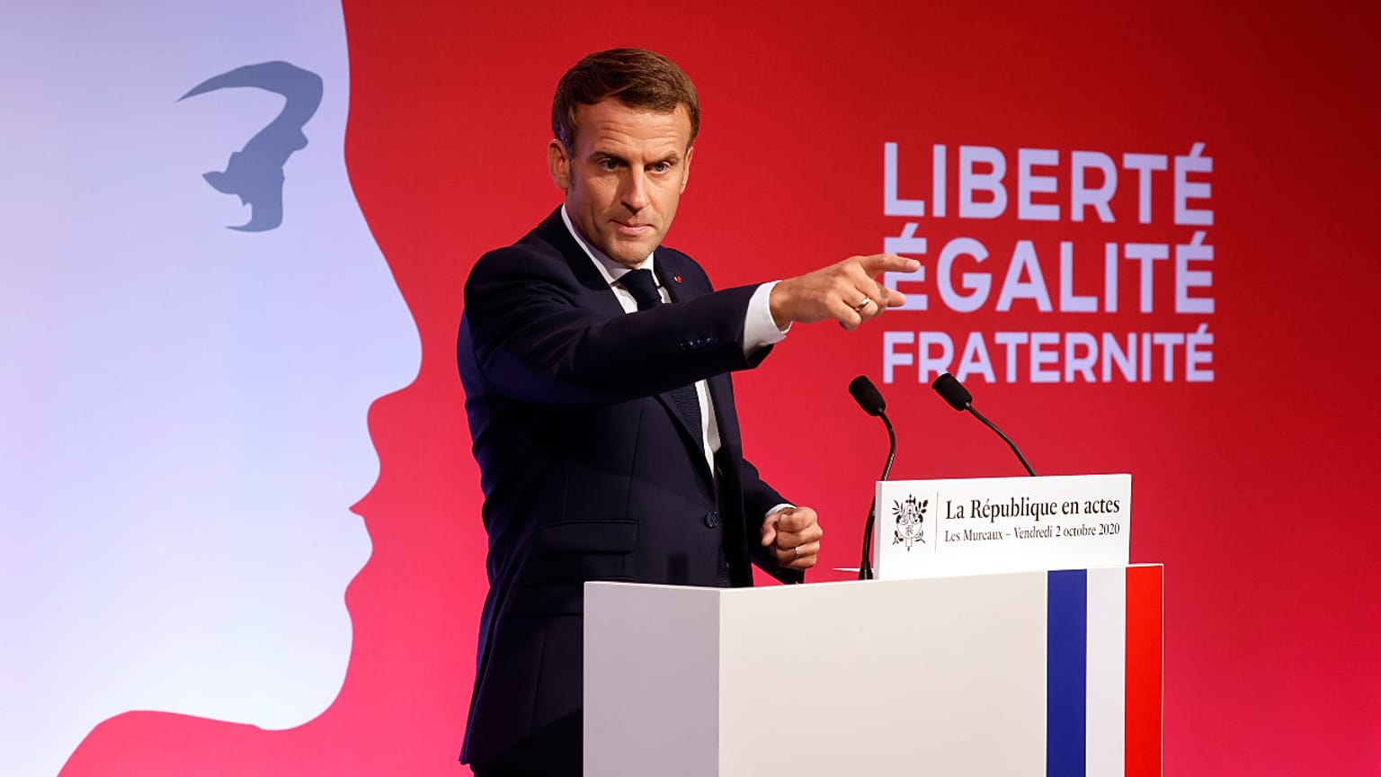 French President Emmanuel Macron delivers a speech to present his strategy to fight separatism, Friday Oct. 2, 2020 in Les Mureaux, outside Paris.