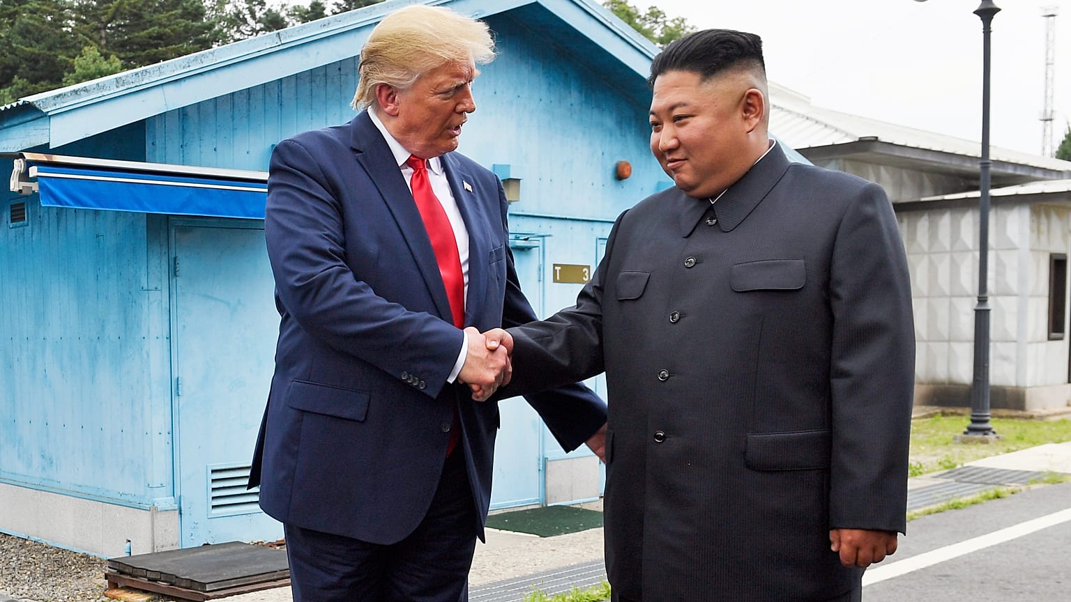 In this June 30, 2019, file photo, President Donald Trump shakes hands with North Korean leader Kim Jong Un in the Demilitarized Zone, South Korea.